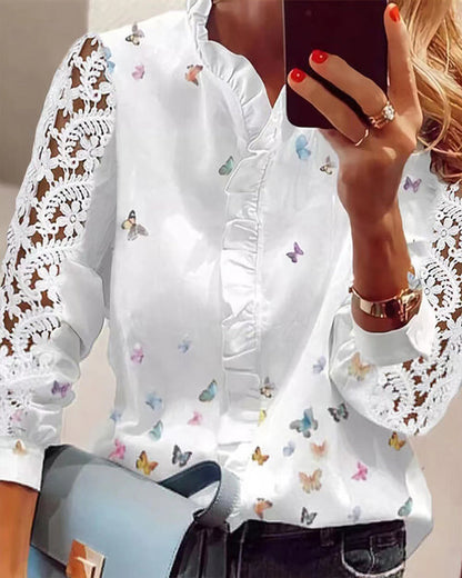 Blouse met patchworkprint