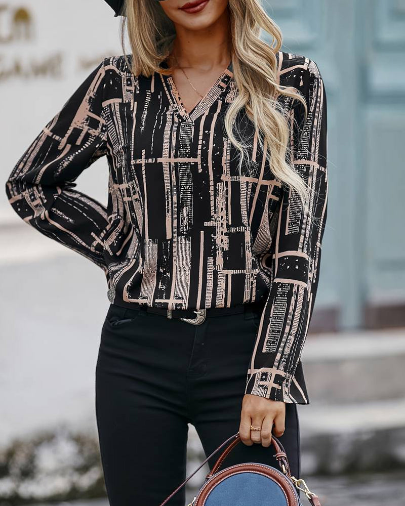 Blouse met eenvoudige print en V-hals