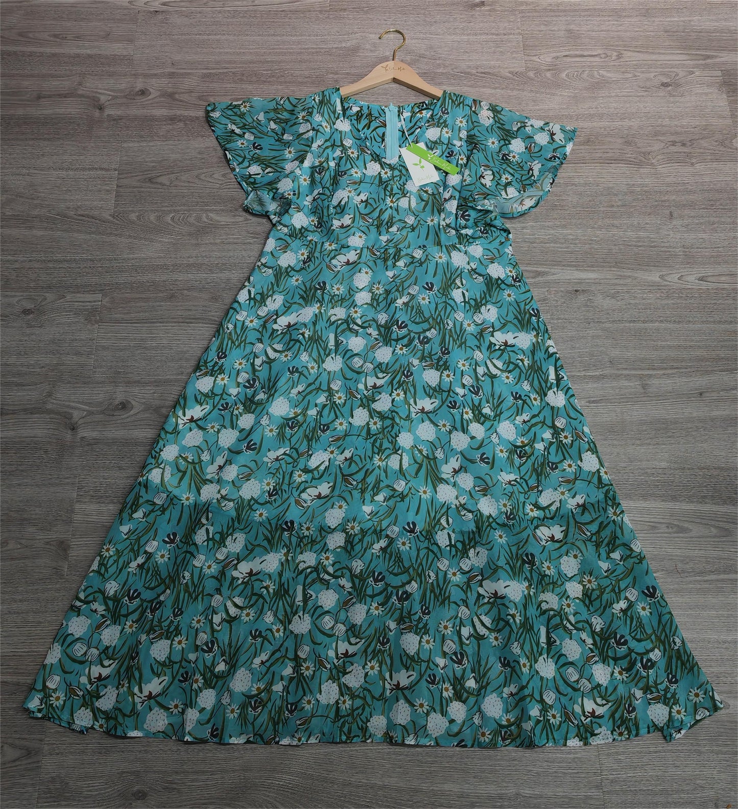 SpringStil® - Groene midi-jurk met steekzakken