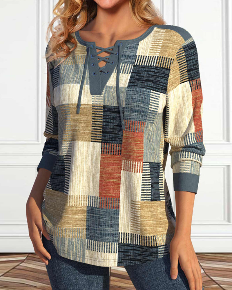 Top met vetersluiting en geometrische print