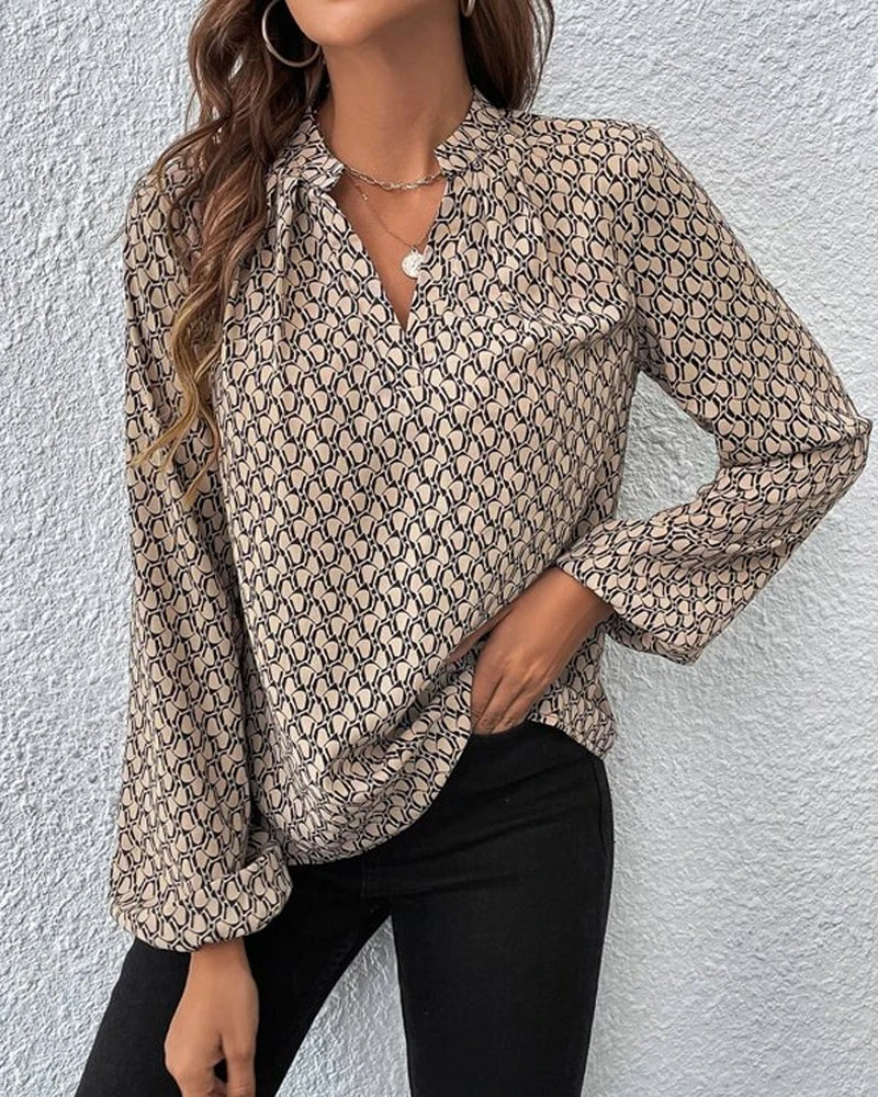 Elegante, bedrukte blouse met V-halslijn