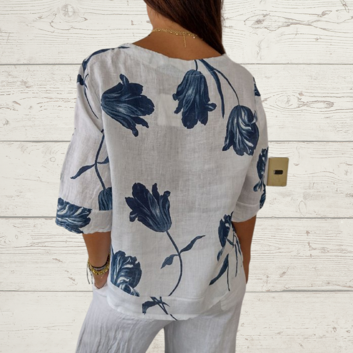 Clara - marineblauwe blouse met print