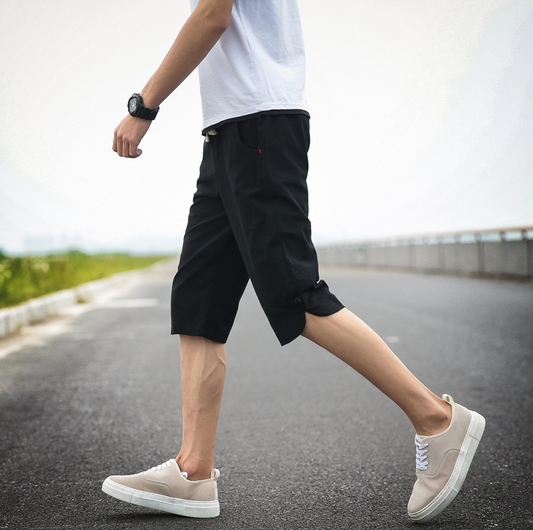 Ralf's korte broek voor op het strand