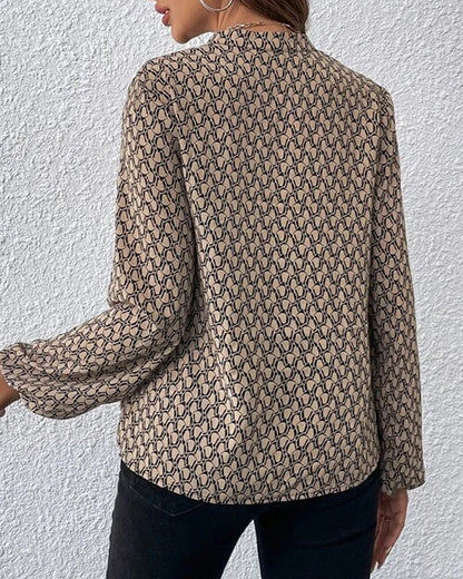 Elegante, bedrukte blouse met V-halslijn