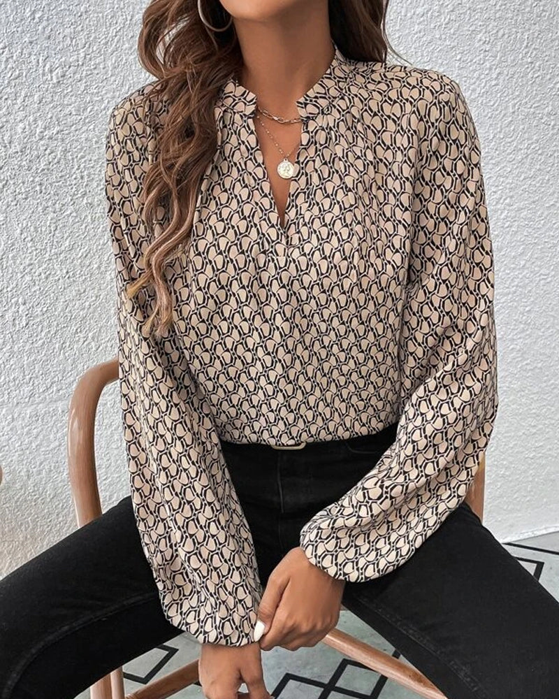 Elegante, bedrukte blouse met V-halslijn