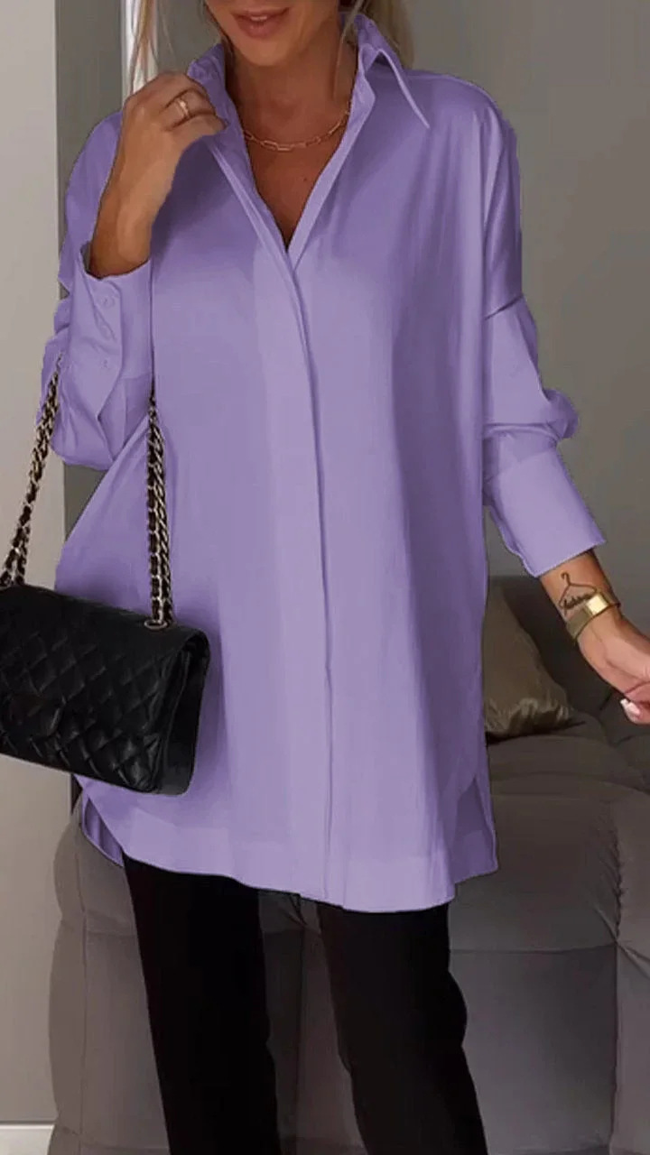 Elegante oversized blouse met opgerolde mouwen