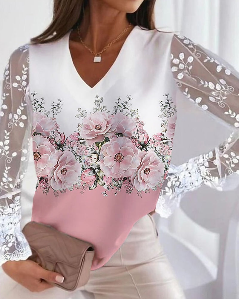 Elegante top met bloemenprint en kanten mouwen