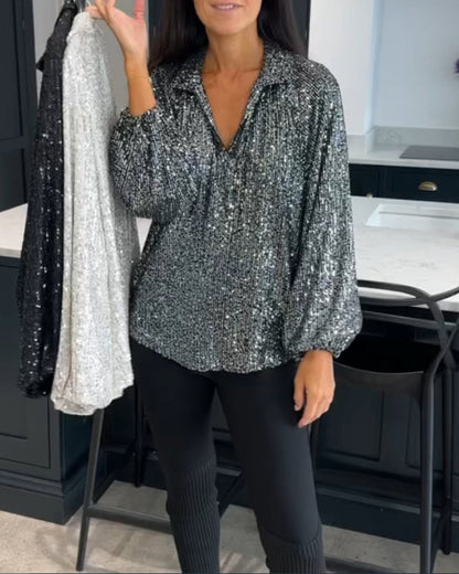 Blouse met pailletten en effen kleuren