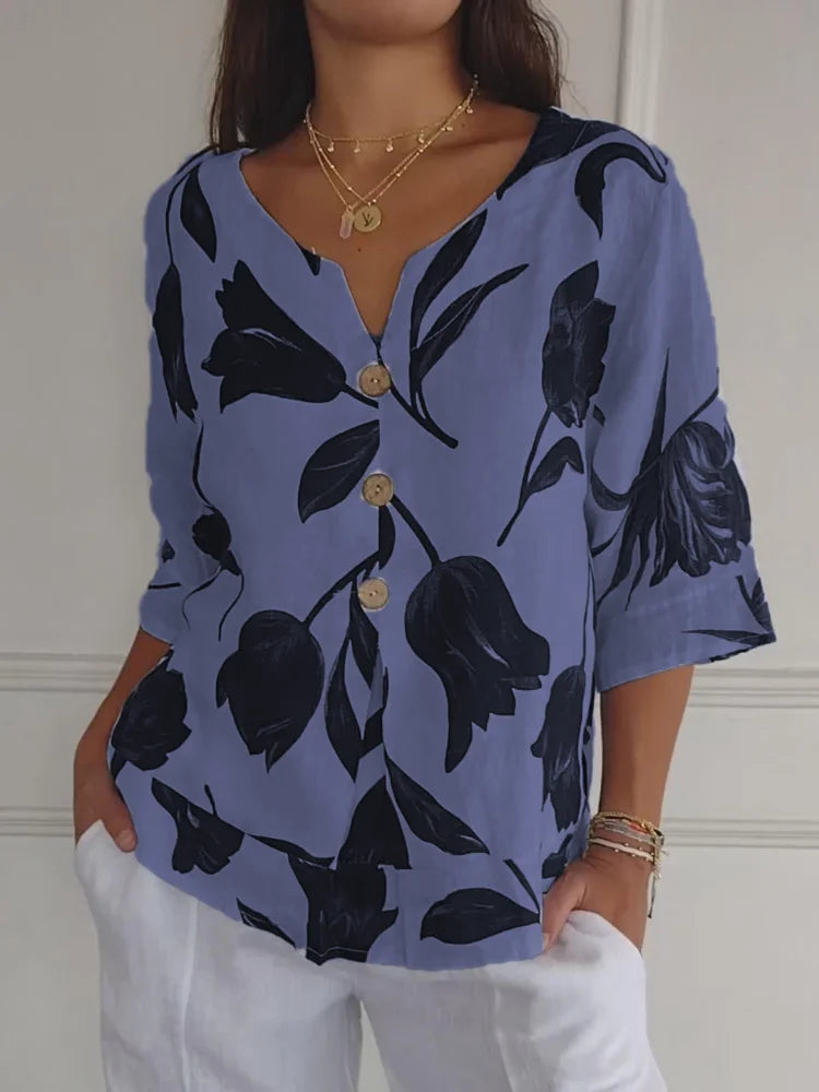 Clara - marineblauwe blouse met print