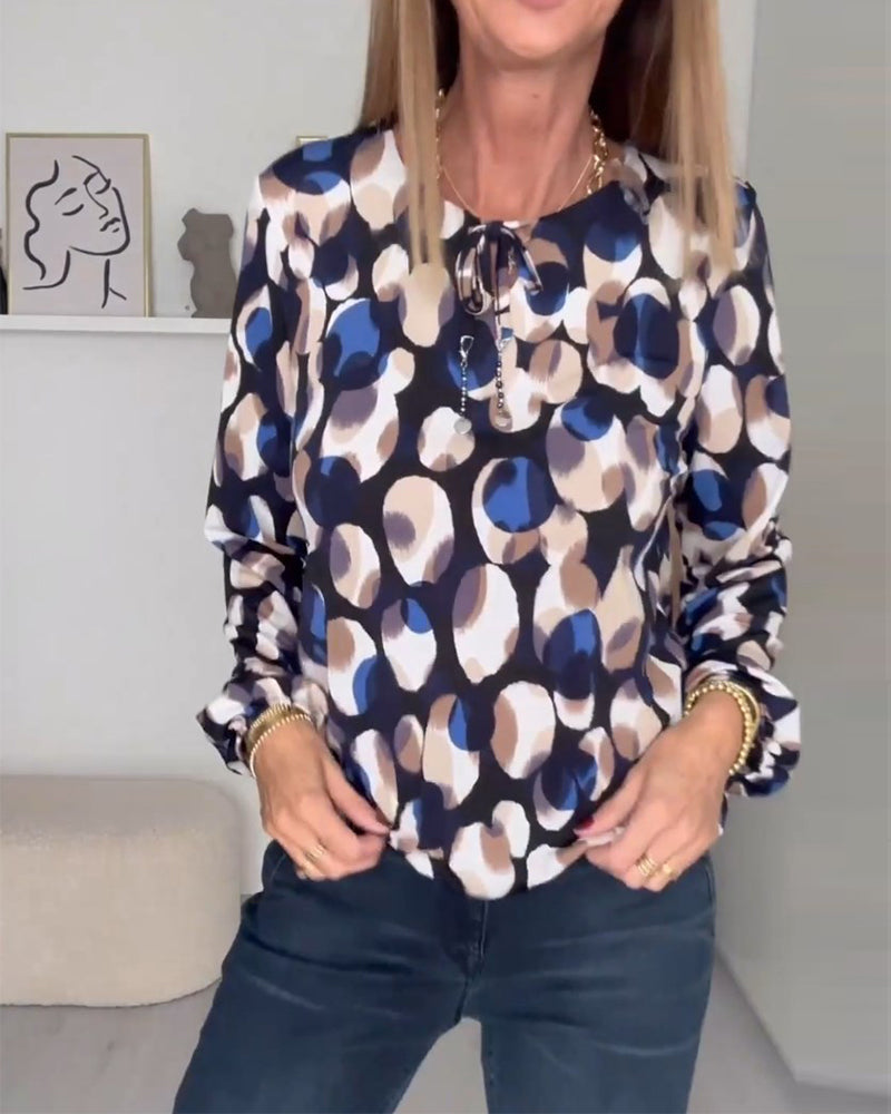 Bedrukte, elegante blouse met bandjes