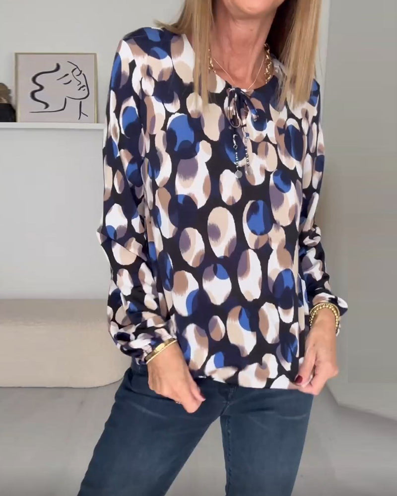 Bedrukte, elegante blouse met bandjes